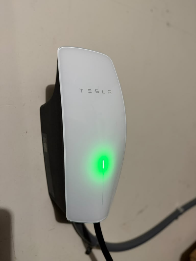 Wall-mounted Tesla EV charger